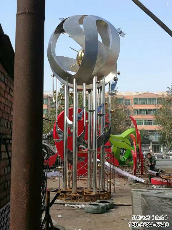 地球儀雕塑定制，小區(qū)雕塑，不銹鋼手托地球儀雕塑廠家