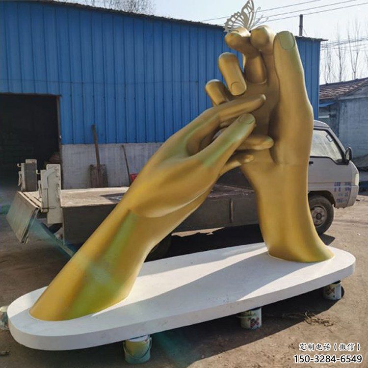 握手雕塑生產(chǎn)商，小區(qū)雕塑，不銹鋼握手雕塑廠家展品