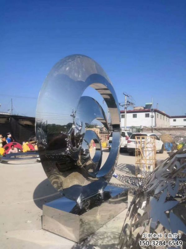 花園圓鏡雕塑點擊，多彩藝術(shù)，不銹鋼圓鏡雕塑訂做承接